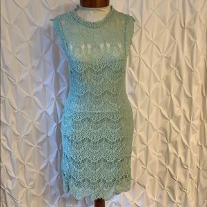 Mint dress backless and beautiful lace work.